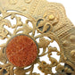 vintage brass metal shield medallion BROOCH dark orange goldstone jewelry pin